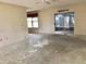 Spacious living room area with sliding glass doors and ample natural light at 307 Santa Clara Cir, Lady Lake, FL 32159
