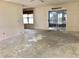 Living room with sliding glass doors and ceiling fan at 307 Santa Clara Cir, Lady Lake, FL 32159