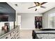 Bedroom with a ceiling fan, closet, dresser, and a large window with natural light at 3251 Oak Lake Pl # 135, Winter Park, FL 32792