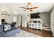 Cozy living room featuring stylish decor and a ceiling fan at 3251 Oak Lake Pl # 135, Winter Park, FL 32792