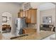 Open kitchen with granite counters, stainless steel appliances and ample cabinetry at 3416 Gerber Daisy Ln, Oviedo, FL 32766