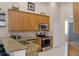 Well-equipped kitchen featuring stainless steel appliances and granite countertops at 3416 Gerber Daisy Ln, Oviedo, FL 32766
