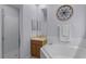 Corner soaking tub in this main bathroom with double mirrors and shower with tile surround at 3416 Gerber Daisy Ln, Oviedo, FL 32766