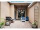 Outdoor patio featuring brick flooring, grill, ceiling fan, and outdoor seating area at 3416 Gerber Daisy Ln, Oviedo, FL 32766