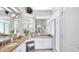 Elegant bathroom with double sinks, granite countertops, and a stylish glass-enclosed shower at 3617 Cherry Hill Dr, Orlando, FL 32822