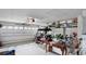 Spacious garage featuring white garage door, golf cart, and room for storage and hobbies at 3617 Cherry Hill Dr, Orlando, FL 32822