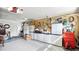 Garage featuring door, storage cabinets and tool racks at 3617 Cherry Hill Dr, Orlando, FL 32822
