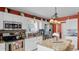 Well-equipped kitchen featuring stainless steel appliances, granite countertops and ample storage space at 3617 Cherry Hill Dr, Orlando, FL 32822