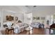Inviting living room with comfortable sofas, hardwood floors, and an open layout at 3617 Cherry Hill Dr, Orlando, FL 32822