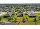 Bird's eye view of the property showcases the neighborhood and the fenced-in yard at 3808 Enchantment Ln, St Cloud, FL 34772