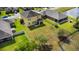 Expansive backyard featuring lush green grass and a screened in patio, perfect for outdoor enjoyment at 3808 Enchantment Ln, St Cloud, FL 34772