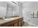 Bathroom featuring granite counters and a full sized vanity at 3808 Enchantment Ln, St Cloud, FL 34772