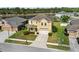 Charming two-story home with a well-manicured lawn and inviting curb appeal at 3808 Enchantment Ln, St Cloud, FL 34772