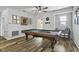 Spacious game room features a full-sized pool table and stylish decor at 3808 Enchantment Ln, St Cloud, FL 34772