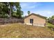 Backyard featuring a grassy yard, fence and patio at 428 Winding Oak Ln, Longwood, FL 32750