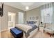 Bedroom features a ensuite bathroom, walk-in closet, and lots of natural light at 4418 Shiva Loop, Kissimmee, FL 34746