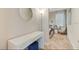 Hallway leading to bedroom, features vanity area with stool at 4418 Shiva Loop, Kissimmee, FL 34746