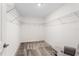 This walk-in closet provides ample storage and organization with wire shelving at 4423 Blackbird St, Kissimmee, FL 34746