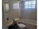 Neutral bathroom with tiled walls, a shower-tub combination, and a functional vanity at 5505 Hernandes Dr # 118, Orlando, FL 32808