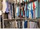 Large walk-in closet offers ample storage space for clothes at 5896 Barclay Ct, The Villages, FL 32163