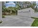 A detached two-car garage and a small pool are on the property at 613 Daniels Ave, Orlando, FL 32801