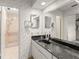 Updated bathroom with modern vanity and walk-in shower at 6301 Parson Brown Dr, Orlando, FL 32819