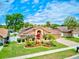 Stunning home with a beautifully landscaped front yard and welcoming curb appeal at 677 Cheoy Lee Cir, Winter Springs, FL 32708