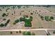 An aerial view displays the expansive acreage and homes on the beautiful property at 7823 Baron Ave, Howey In The Hills, FL 34737