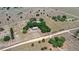 An aerial view shows the vast and spacious property with two homes and scattered trees at 7823 Baron Ave, Howey In The Hills, FL 34737