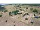 An aerial view shows the property boundaries and homes on this vast acreage at 7823 Baron Ave, Howey In The Hills, FL 34737