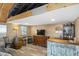 Finished basement area with wood-look floors, bar, and stylish furnishings at 7823 Baron Ave, Howey In The Hills, FL 34737