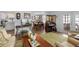 Open living space featuring a living room, dining area, and kitchen at 8 Cocos Plumosa Dr # A, Eustis, FL 32726