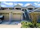 Charming two-story condo featuring a two-car garage and well-maintained landscaping at 9423 Myrtle Creek Ln # 510, Orlando, FL 32832