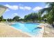 Community pool on a sunny day at 9423 Myrtle Creek Ln # 510, Orlando, FL 32832