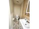 Compact bathroom with a toilet, and a sink with granite countertop at 101 Dovetail Ct, Apopka, FL 32703