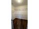 Walk-in closet with wood floor and wire shelving at 11446 Jasper Kay Terrace # 202, Windermere, FL 34786