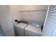 Laundry room features washer and dryer at 11446 Jasper Kay Terrace # 202, Windermere, FL 34786