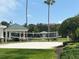 Well-maintained sand volleyball court surrounded by landscaping and nearby gazebo at 11446 Jasper Kay Terrace # 202, Windermere, FL 34786