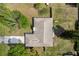 Aerial view of the property showing the roofline and surrounding landscape at 1831 W Clinton Dr, St Cloud, FL 34769