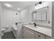 Modern bathroom featuring white subway tile, updated vanity, and elegant fixtures at 1831 W Clinton Dr, St Cloud, FL 34769