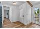 Bright entryway featuring wood look floors and a decorative glass front door at 1831 W Clinton Dr, St Cloud, FL 34769