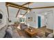 Inviting living room boasting exposed wood beams and an open floor plan at 1831 W Clinton Dr, St Cloud, FL 34769