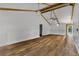 Spacious living room with beautiful hardwood floors and exposed wood beams at 1831 W Clinton Dr, St Cloud, FL 34769