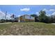 Two-story home featuring an attached garage and manicured landscaping in a peaceful setting at 2004 Prescott Blvd, Deltona, FL 32738
