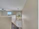 Foyer featuring high ceilings, modern lighting, and a view of the front entrance at 2004 Prescott Blvd, Deltona, FL 32738