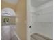 Walk-in closet with gray flooring and metal shelving provides ample storage space at 2004 Prescott Blvd, Deltona, FL 32738