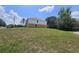 A spacious yard surrounds the two-story home, creating a beautiful outdoor space at 2004 Prescott Blvd, Deltona, FL 32738