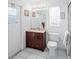 Bathroom featuring a vanity with a granite countertop and tiled floors at 202 Aylesbury Ln, Davenport, FL 33837
