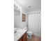 Bright bathroom with tub-shower combination and classic vanity at 202 Aylesbury Ln, Davenport, FL 33837
