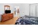 Spacious bedroom with a view to the kitchen and dining area at 202 Aylesbury Ln, Davenport, FL 33837